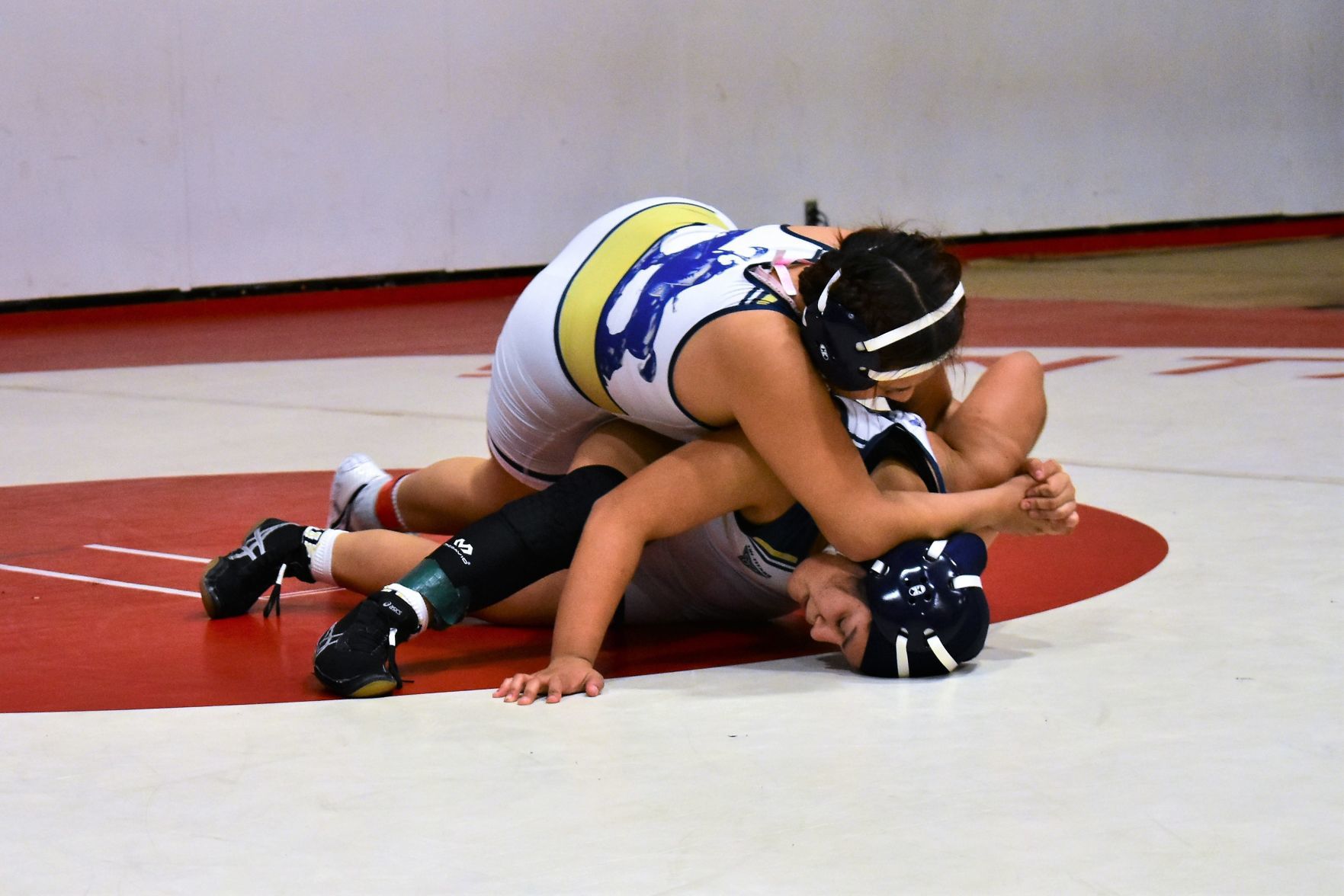 Dos Pueblos' Paola De La Cruz tries to pin teammate Maria Silva